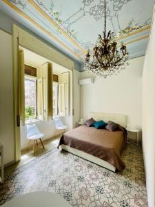 En eller flere senge i et værelse på Be Happy Salerno