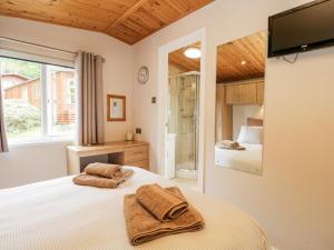 Säng eller sängar i ett rum på Esthwaite Lodge