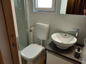 Ένα μπάνιο στο Mobile home AGAVA