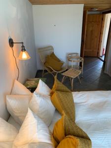 Voodi või voodid majutusasutuse Pilguse Residency toas