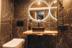 Kúpeľňa v ubytovaní Hotel Vedmezhyi Dvir