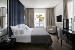 Posteľ alebo postele v izbe v ubytovaní Hotel MiM Ibiza & Spa - Adults Only