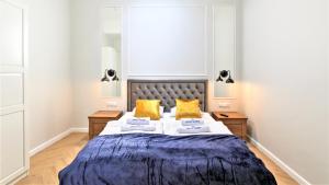 Posteľ alebo postele v izbe v ubytovaní Apartamenty Royal Maris 6 - najlepsza lokalizacja w Ustce, blisko plaży i portu, bezpłatny parking, ścicsłe centrum