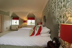 Ein Bett oder Betten in einem Zimmer der Unterkunft Leeds Castle Stable Courtyard Bed and Breakfast