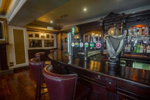 Ο χώρος του lounge ή του μπαρ στο The Carraig Hotel