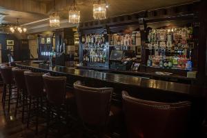Ο χώρος του lounge ή του μπαρ στο The Carraig Hotel