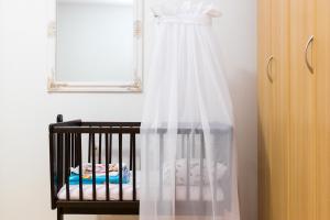 Postel nebo postele na pokoji v ubytování Apartment Grafulin