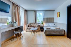 Posteľ alebo postele v izbe v ubytovaní Ambre Mare - Wypoczynek pod Palmami