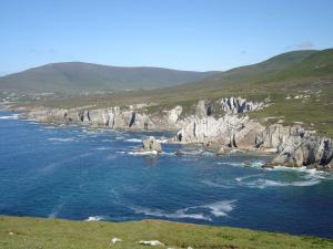 a body of water with rocks in the ocean at Hy Breasal B&B in Achill Sound