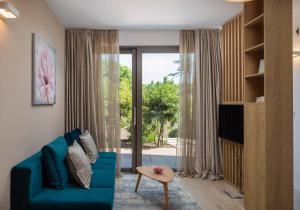 TV a/nebo společenská místnost v ubytování Dedaj Resort - Villa Tina