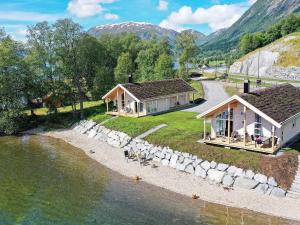 an aerial view of a house next to a river at Holiday home skei i jølster V in Skei 