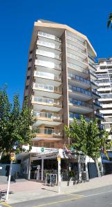 a tall building with a street in front of it at Apartamentos Amalia By Mc in Benidorm