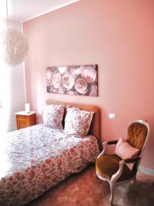 A bed or beds in a room at CASA PAOLINA NEL CENTRO DI BRACCIANO