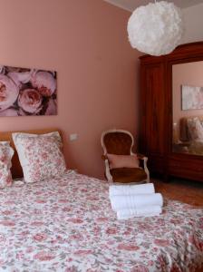A bed or beds in a room at CASA PAOLINA NEL CENTRO DI BRACCIANO