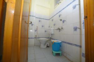 Phòng tắm tại HOTEL ASWINI GRAND LODGE