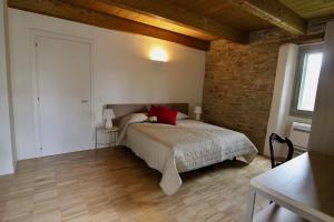 Postel nebo postele na pokoji v ubytování Relais Mevigo - Casa Pietra + 36 fotografií