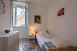 Postel nebo postele na pokoji v ubytování Apartment Eša