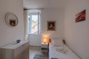 Postel nebo postele na pokoji v ubytování Apartment Eša