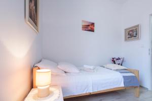 Postel nebo postele na pokoji v ubytování Apartment Eša