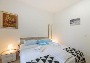Postel nebo postele na pokoji v ubytování Apartment Eša