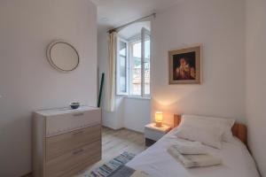 Postel nebo postele na pokoji v ubytování Apartment Eša
