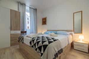 Postel nebo postele na pokoji v ubytování Apartment Eša