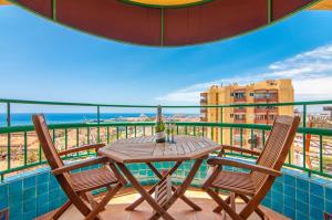A balcony or terrace at Torres del Sol Ocean View PH02