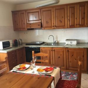 A kitchen or kitchenette at Home Iseo Lake