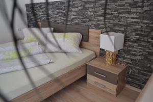 Postel nebo postele na pokoji v ubytování Appartement Thermenzeit