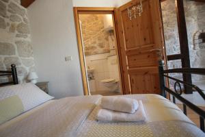 Postel nebo postele na pokoji v ubytování Cottage Sammon