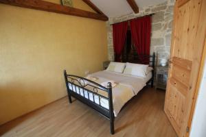 Postel nebo postele na pokoji v ubytování Cottage Sammon