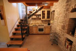 Kuchyň nebo kuchyňský kout v ubytování Cottage Sammon