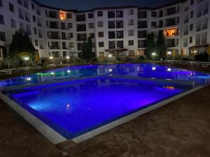 The swimming pool at or close to 3 Room Family Apartment with Pool View (4 min. away from the Sea)
