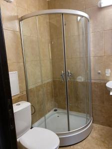 A bathroom at 3 Room Family Apartment with Pool View (4 min. away from the Sea)
