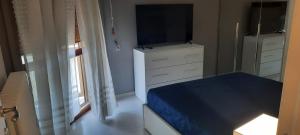 TV a/nebo společenská místnost v ubytování Panorama Lecce