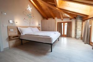 Postel nebo postele na pokoji v ubytování B&B da Sabry e Gian