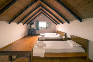 Voodi või voodid majutusasutuse All In Krinas Apart-Hotel toas