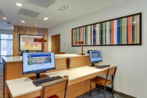 an office with two computers on a desk at Holiday Inn Express & Suites - Winston - Salem SW - Clemmons, an IHG Hotel in Clemmons