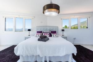 Łóżko lub łóżka w pokoju w obiekcie Casa Media Luna, Mijas Malaga