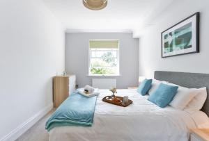 Postelja oz. postelje v sobi nastanitve KVM - Jubilee Mansions Apartment by KVM Stays