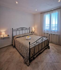 Posteľ alebo postele v izbe v ubytovaní Agriturismo Sotto la Rocca