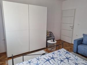 Posteľ alebo postele v izbe v ubytovaní Apartman Nataly