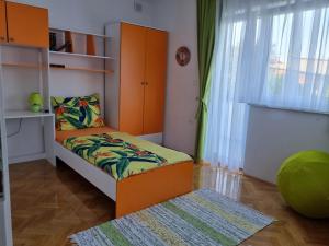 Posteľ alebo postele v izbe v ubytovaní Apartman Nataly