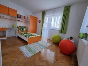 Posteľ alebo postele v izbe v ubytovaní Apartman Nataly