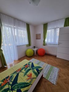 Posteľ alebo postele v izbe v ubytovaní Apartman Nataly