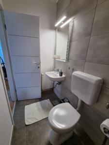 Kúpeľňa v ubytovaní Apartman Nataly
