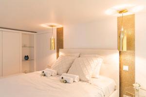 Ліжко або ліжка в номері GuestReady - Stunning Designer 2BR Apartment in Boulogne