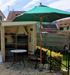 Patio lub wspólna przestrzeń na świeżym powietrzu w obiekcie Un Paraiso Junto al Mar