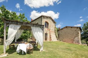 A garden outside Villa le Casine by Mmega