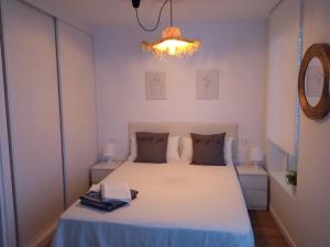 Postel nebo postele na pokoji v ubytování HH Apartamento Algarrobo costa
